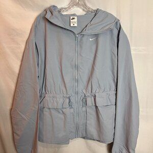 Women's lightweight lt blue Nike Jacket, w/hood, Size XS, NWT